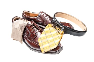 Brown leather shoes with necktie clipart