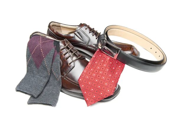Brown dress shoes with red necktie — Stock Photo, Image