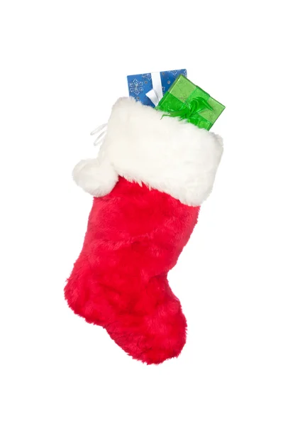 Christmas stocking with presents isolated on white — Stock Photo, Image