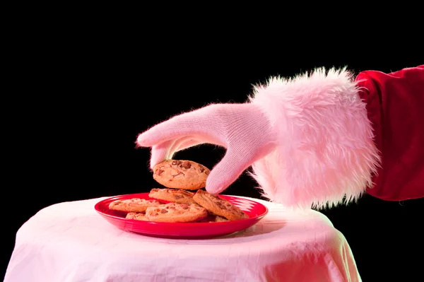Santa med cookie — Stockfoto