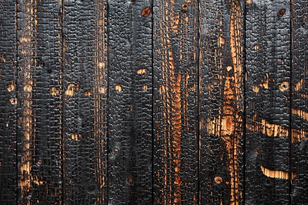 Verbrand hout achtergrond — Stockfoto