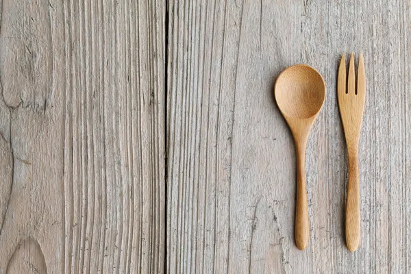 Cucchiaio e forchetta in legno — Foto Stock