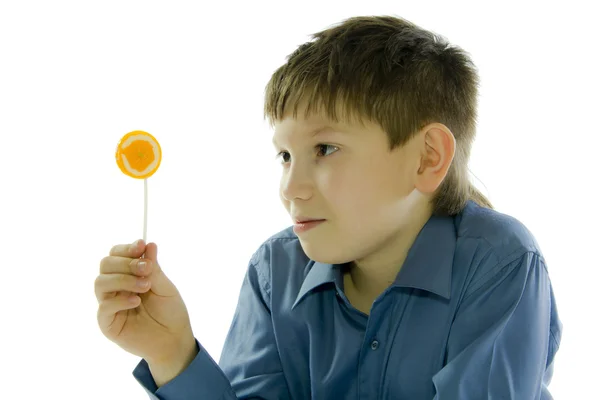 Pojke med lollipop — Stockfoto