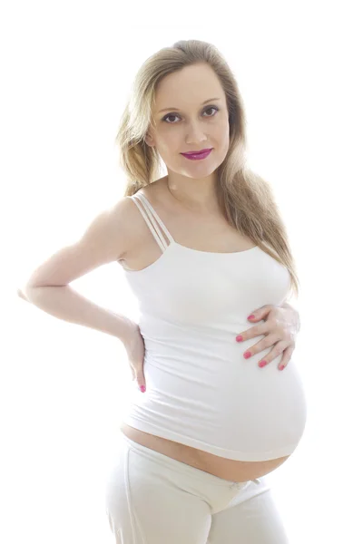 화이트에 임신한 여자 — 스톡 사진