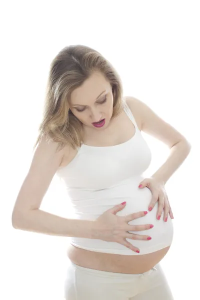 Pregnant woman in white — Stock Photo, Image