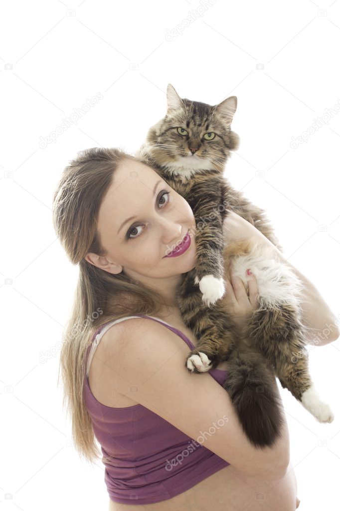 Woman holding, hugging her cat