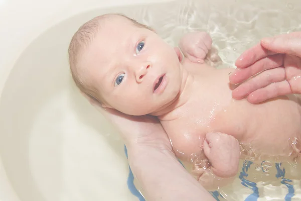 stock image Infant is bathed in the bath