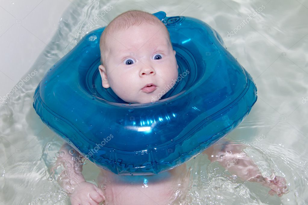 Baby swimmer with rubber ring — Stock 