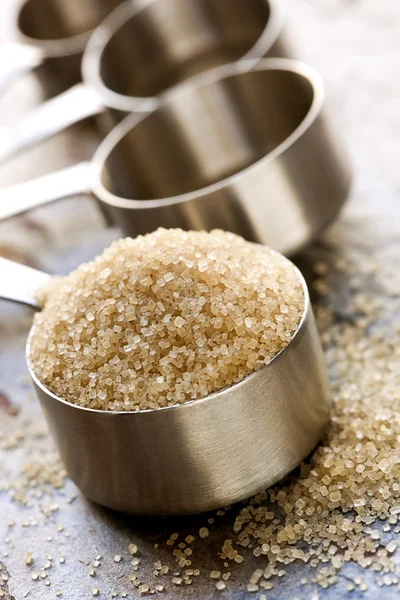 Raw Sugar in Measuring Spoon — Stock Photo, Image
