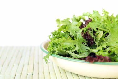 Bowl of Salad Leaves with White Background clipart