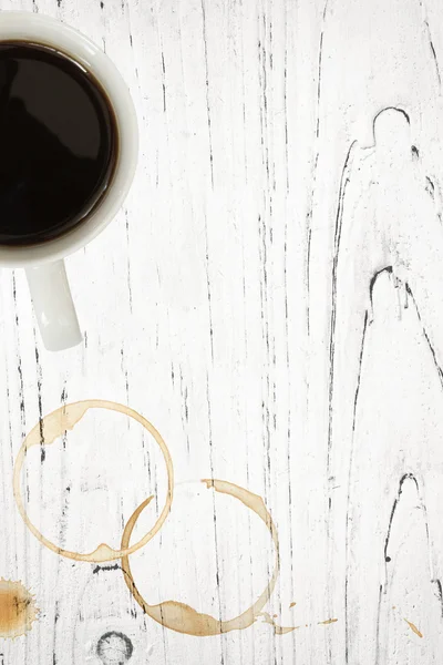 Grunge madeira com xícara de café e manchas — Fotografia de Stock