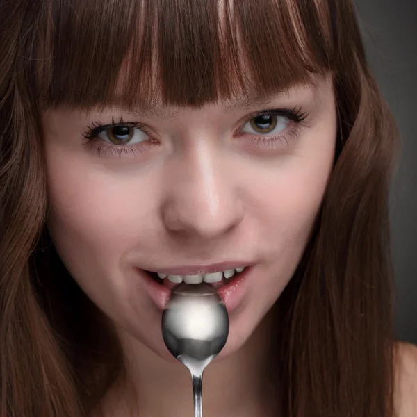 Beauty girl with spoon — Stock Photo, Image