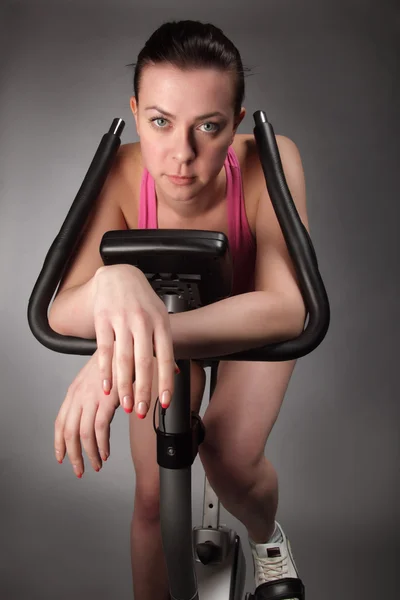 Beauty girl on bicycle exercise — Stock Photo, Image
