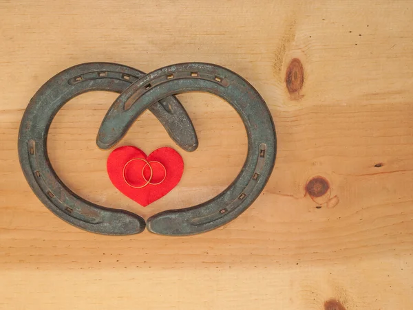 Simple Valentine design with two horseshoes forming a heart — Stock Photo, Image