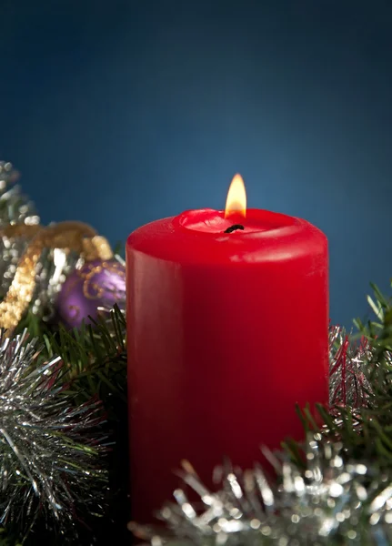 Red Christmas candle burning — Stock Photo, Image