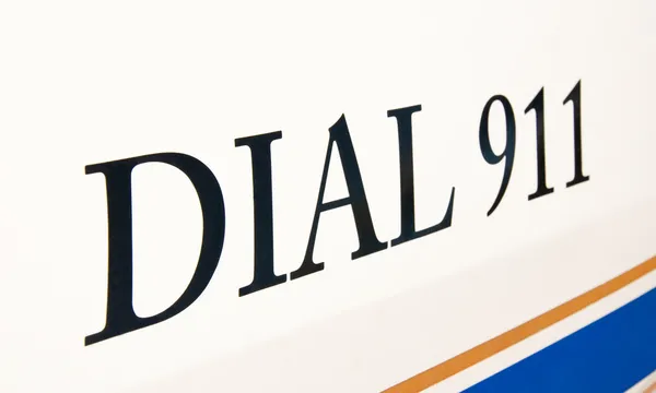 Bellen 911 tekst aan kant van een politie-auto — Stockfoto