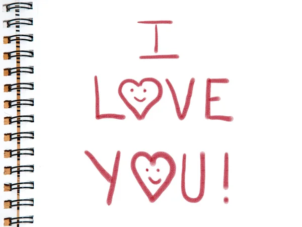 I love you painted in red color on white sketchbook page — Stock Photo, Image