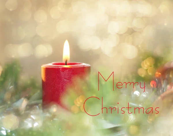 Snový obraz vánoční svíčku, hořící uprostřed věnec — Stock fotografie
