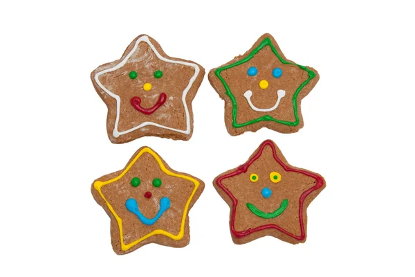 Smiling star shaped Christmas gingerbread cookies — Stock Photo, Image