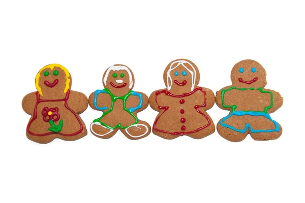 Colorful, smiling gingerbread men and women on white — Stock Photo, Image