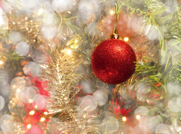 Dreamy image of a beautiful sparkling red Christmas bauble Stock Picture