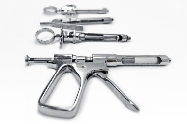 Metal cartrige syringe for intraligametous anesthesia with other clipart