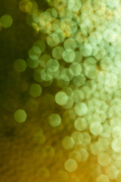 Sparkling blur abstract green background