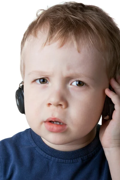 A fiú zenét hallgat. — Stock Fotó