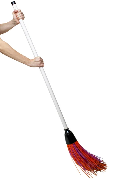Hands holding broom — Stock Photo, Image