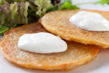 Potato Pancakes with Sour Cream clipart