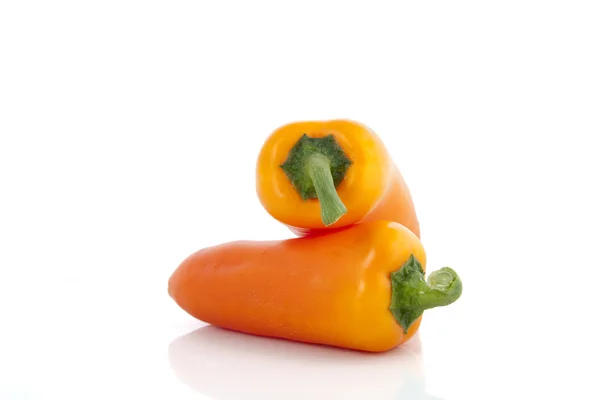 Två orange pepeprs — Stockfoto