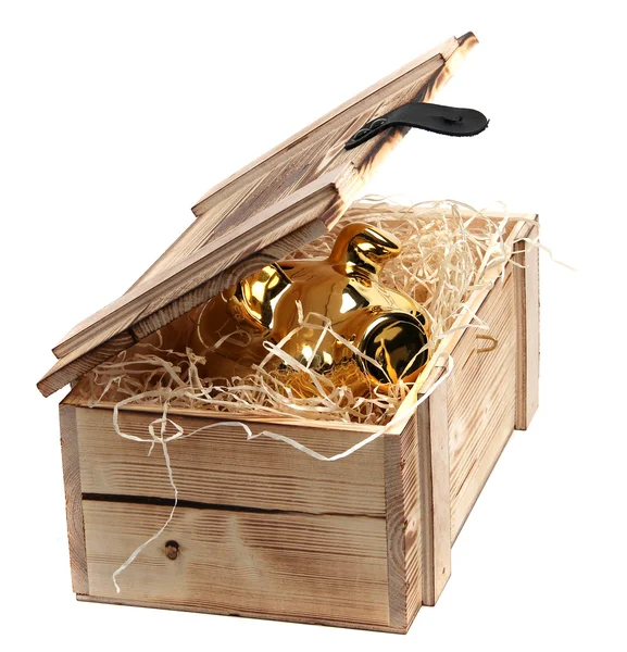 Salvadanaio dorato in scatola con lana di legno — Foto Stock