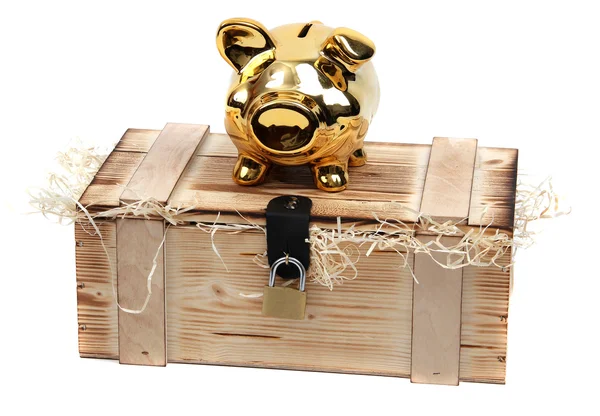 Piggybank on wooden boxlocked with padlock — Stock Photo, Image