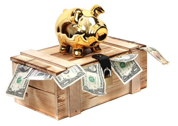 Golden piggybank on wooden case with dollar notes — Stock Photo, Image