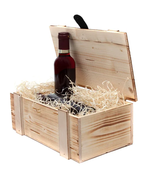 Butelka wina w walizce drewnianej — Zdjęcie stockowe
