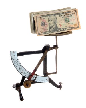 Very old letter scales with dollar notes clipart