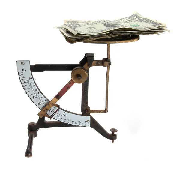 Старые буквы весов с деньгами — стоковое фото
