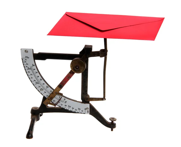 Letter scales with red envelope — Stock Photo, Image