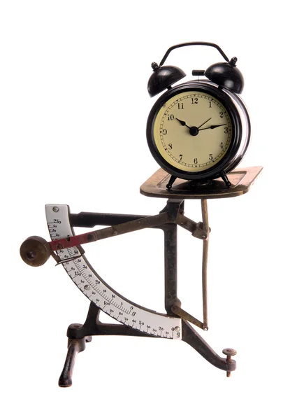 Black alarm bell on old letter scales — Zdjęcie stockowe