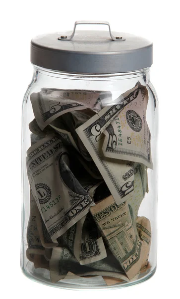 Bin of glass with dollar notes — Stock Photo, Image