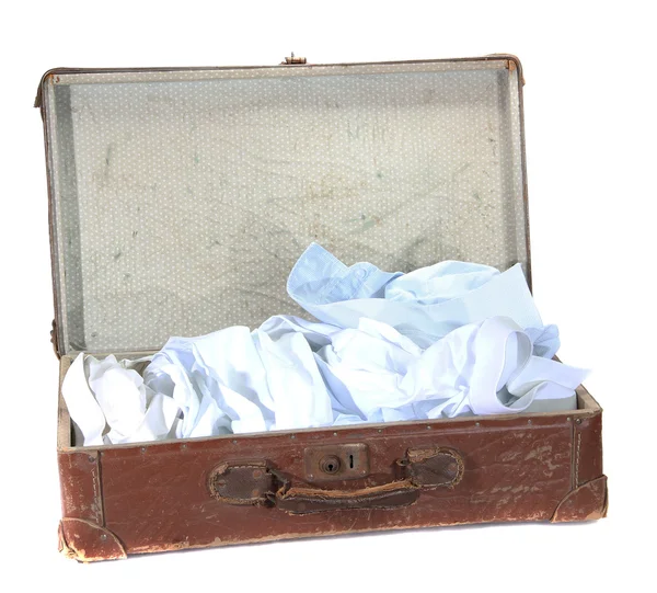 Antiquarian brown suitcase with shirts — Stock Photo, Image