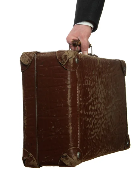 Бизнесмен со старым чемоданом — стоковое фото