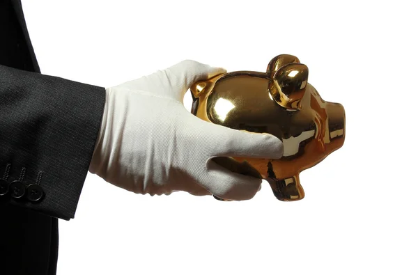 Butler s bílou rukavici zlaté prasátko — Stock fotografie