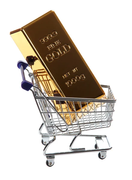 Zlaté zlato v nákupním košíku — Stock fotografie