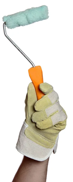 Handyman con guante de trabajo sosteniendo una herramienta de pintura —  Fotos de Stock