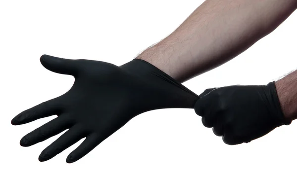 Svarta medicinska handskar — Stockfoto