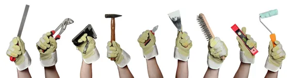 Concept of tools in hands with gloves — Stock Photo, Image