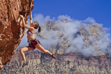 Rock climber dangling. clipart