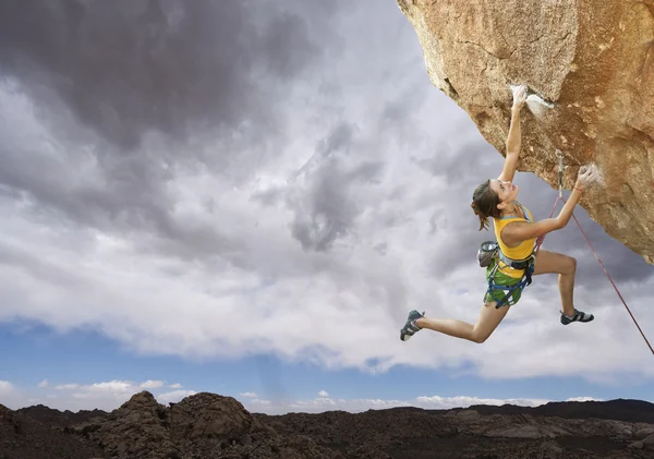 Rock climber dangling. Stock Image