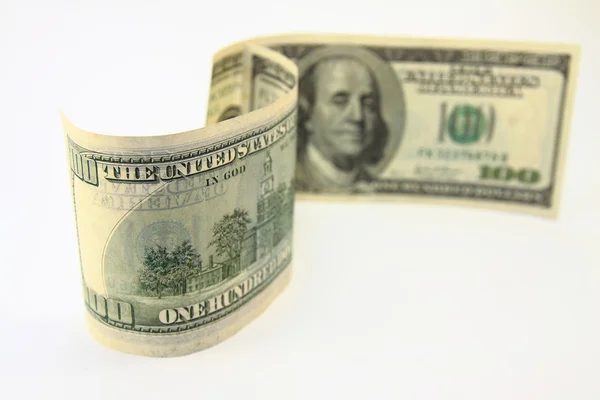 Dólares dinheiro em dackground branco — Fotografia de Stock